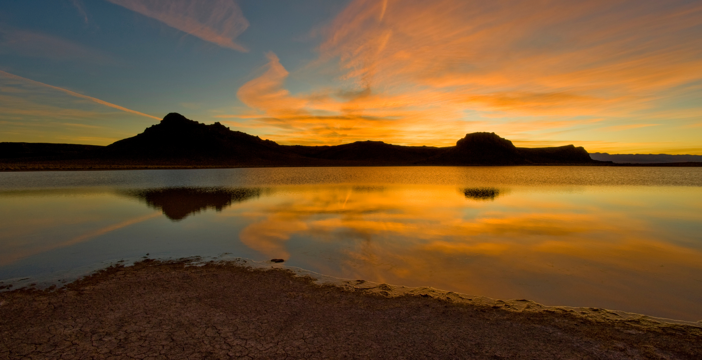 Mountains shadow a sunset at Stillwater Point in Austin Nevada