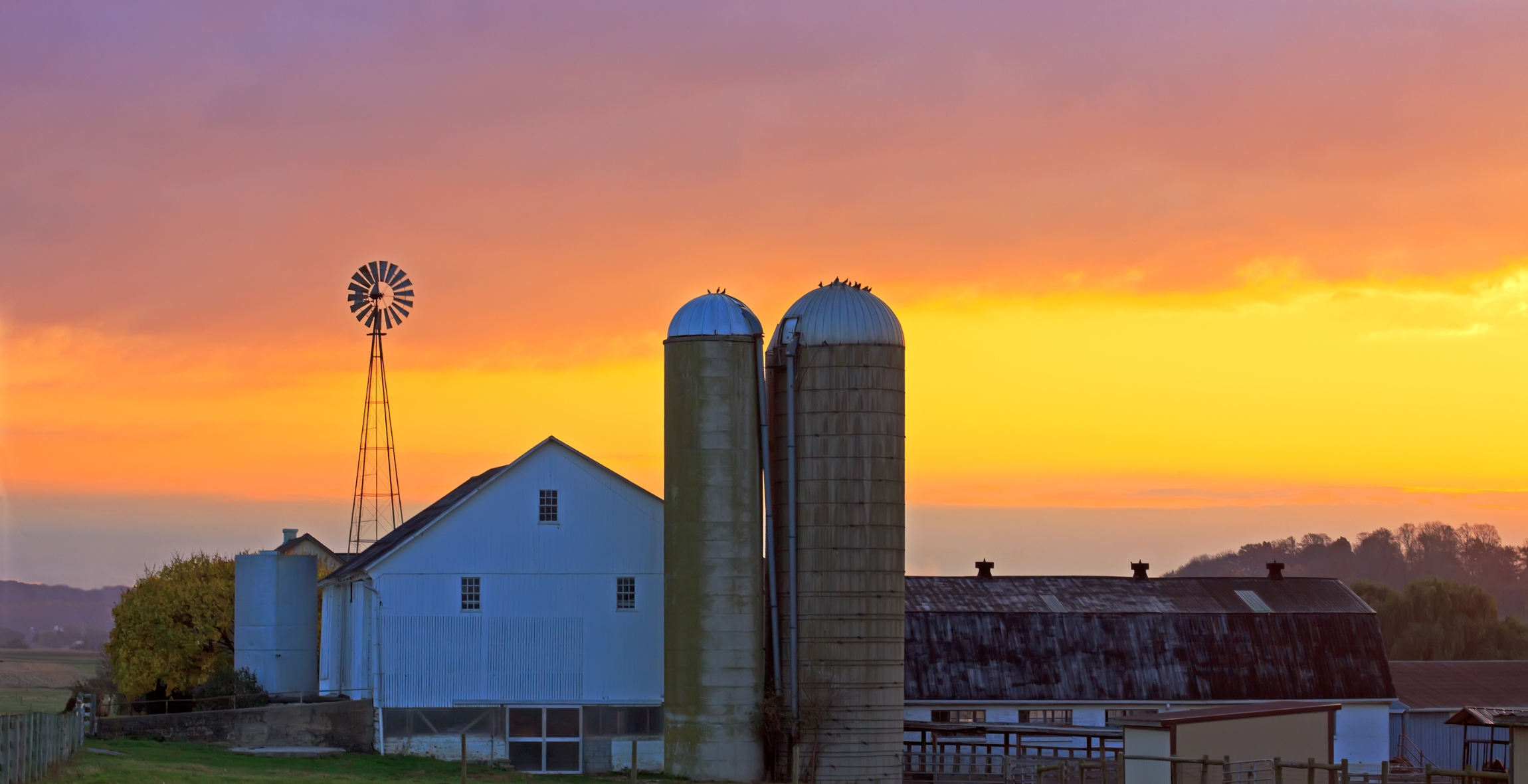 Sunrise behind Amish farm in Lancaster, Pennsylvania 